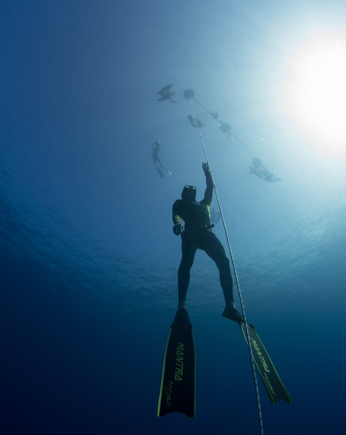 Costa at depth on a single breath, the surface far above
